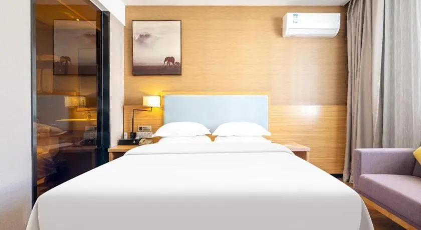 Bed in JTOUR Inn Guigang Life Port High-speed Railway Station