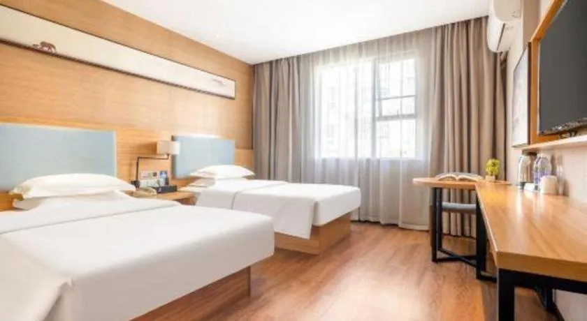 Bed in JTOUR Inn Guigang Life Port High-speed Railway Station