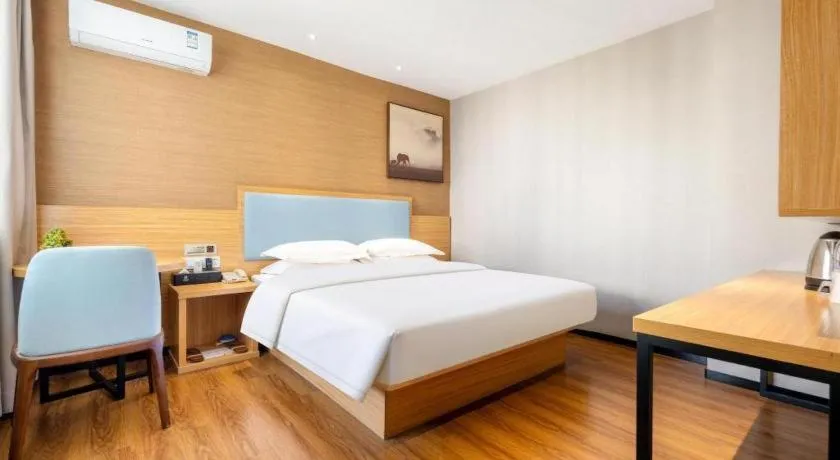 Bed in JTOUR Inn Guigang Life Port High-speed Railway Station