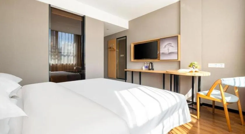 Bed in JTOUR Inn Guigang Life Port High-speed Railway Station