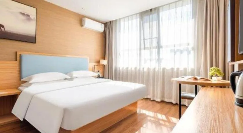 Bed in JTOUR Inn Guigang Life Port High-speed Railway Station