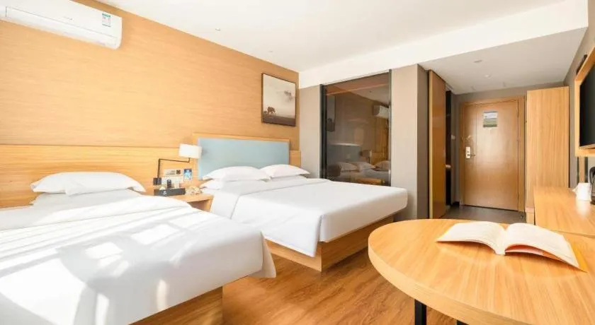 Bed in JTOUR Inn Guigang Life Port High-speed Railway Station