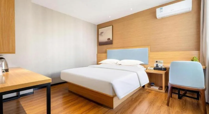 Bed in JTOUR Inn Guigang Life Port High-speed Railway Station