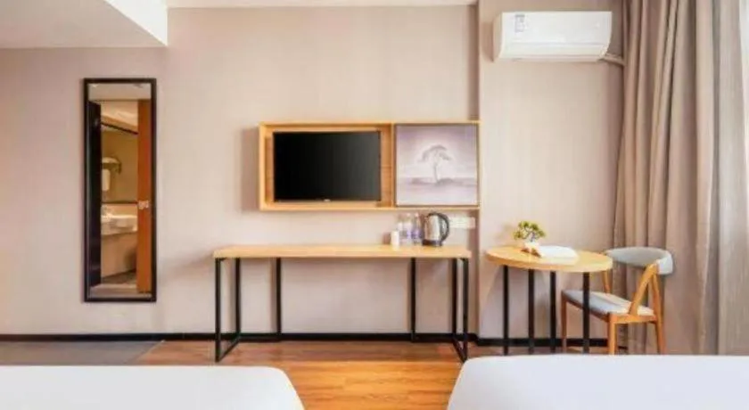 Bed in JTOUR Inn Guigang Life Port High-speed Railway Station