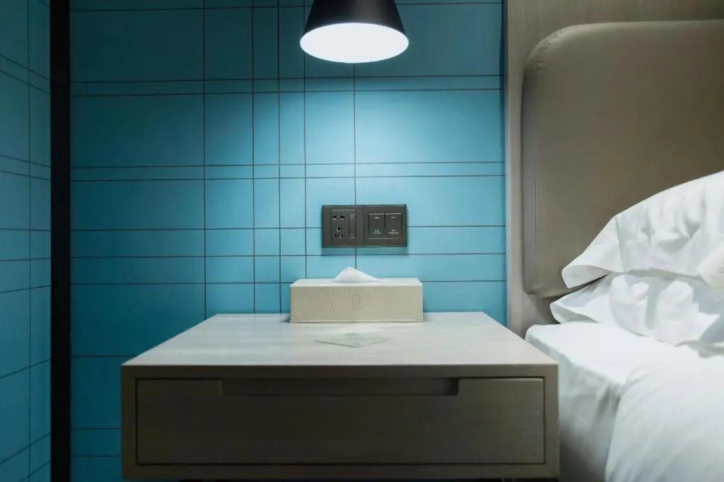 Bed in Echarm Hotel Jianshui Gucheng