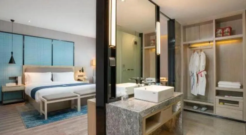 Bed in Echarm Hotel Jianshui Gucheng