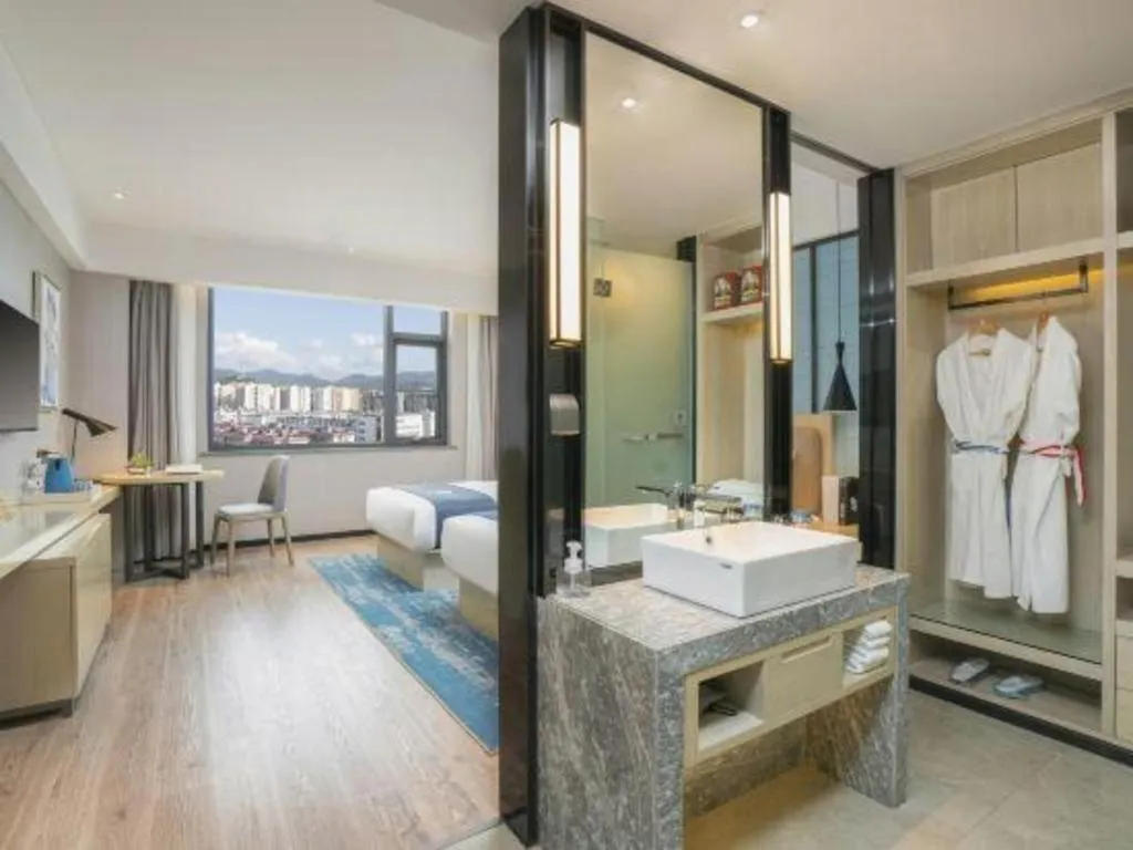 Bed in Echarm Hotel Jianshui Gucheng