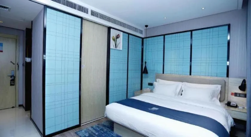 Bed in Echarm Hotel Binzhou Boxing Yinzuo