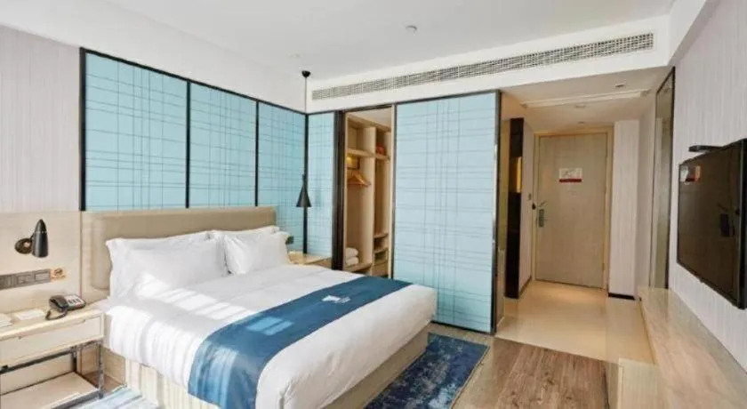 Bed in Echarm Hotel Binzhou Boxing Yinzuo