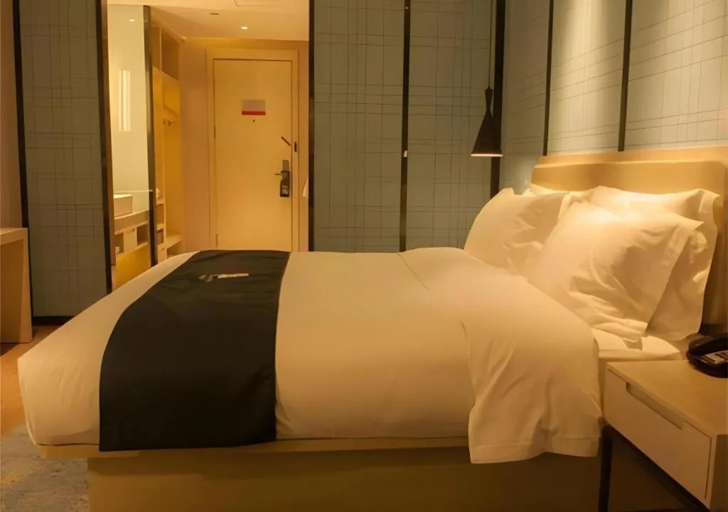 Bed in Echarm Hotel Binzhou Boxing Yinzuo