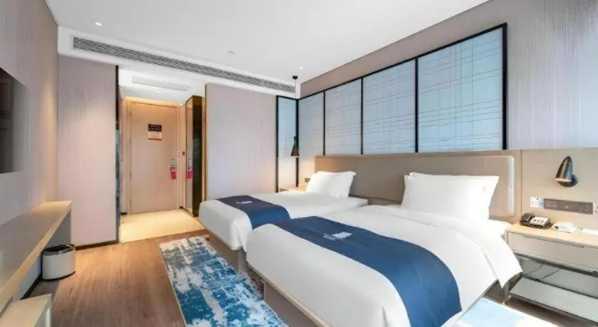 Bed in Echarm Hotel Binzhou Boxing Yinzuo
