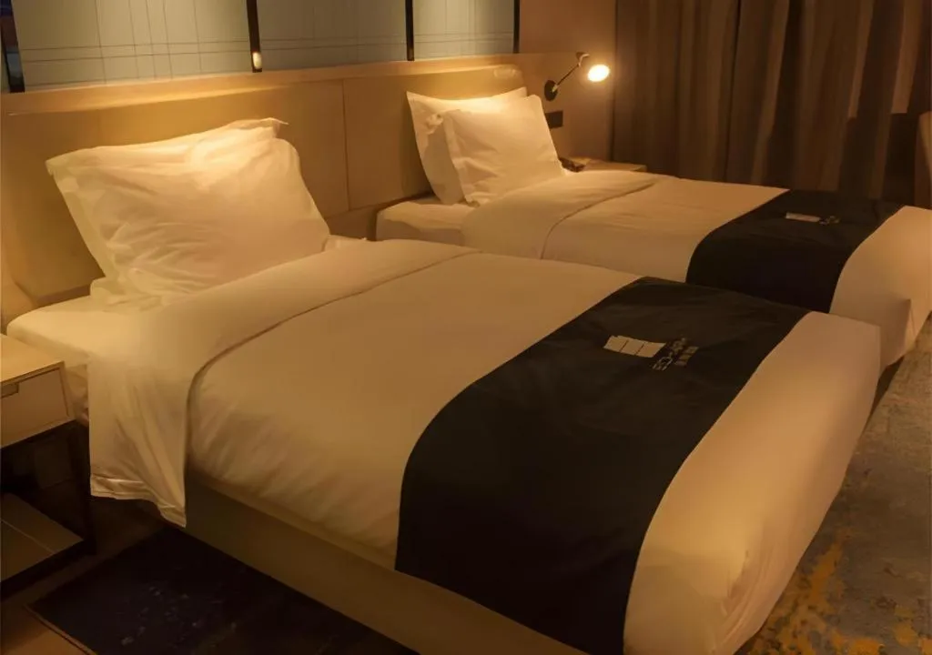 Bed in Echarm Hotel Binzhou Boxing Yinzuo