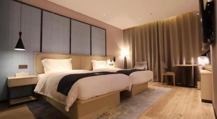 Bed in Echarm Hotel Binzhou Boxing Yinzuo