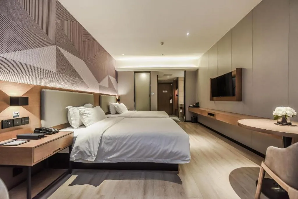 Bed in Borrman Hotel Liuzhou Guizhong Avenue Liugao