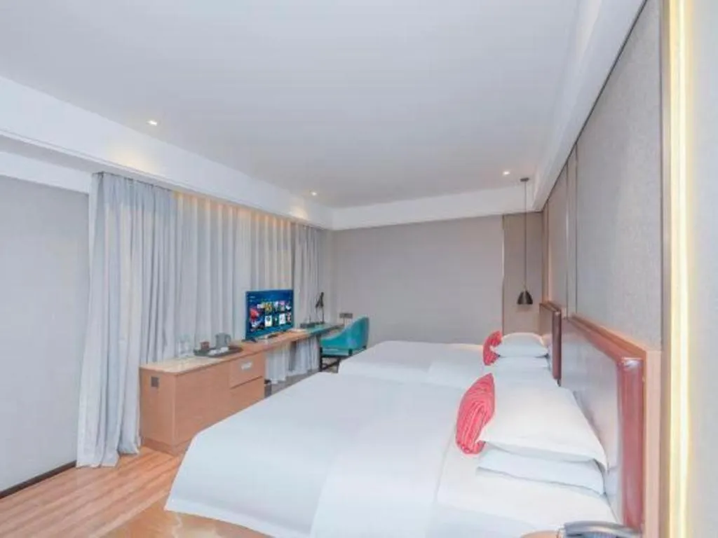 Bed in Borrman Hotel Liuzhou Guizhong Avenue Liugao