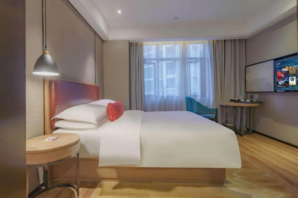 Bed in Borrman Hotel Liuzhou Guizhong Avenue Liugao