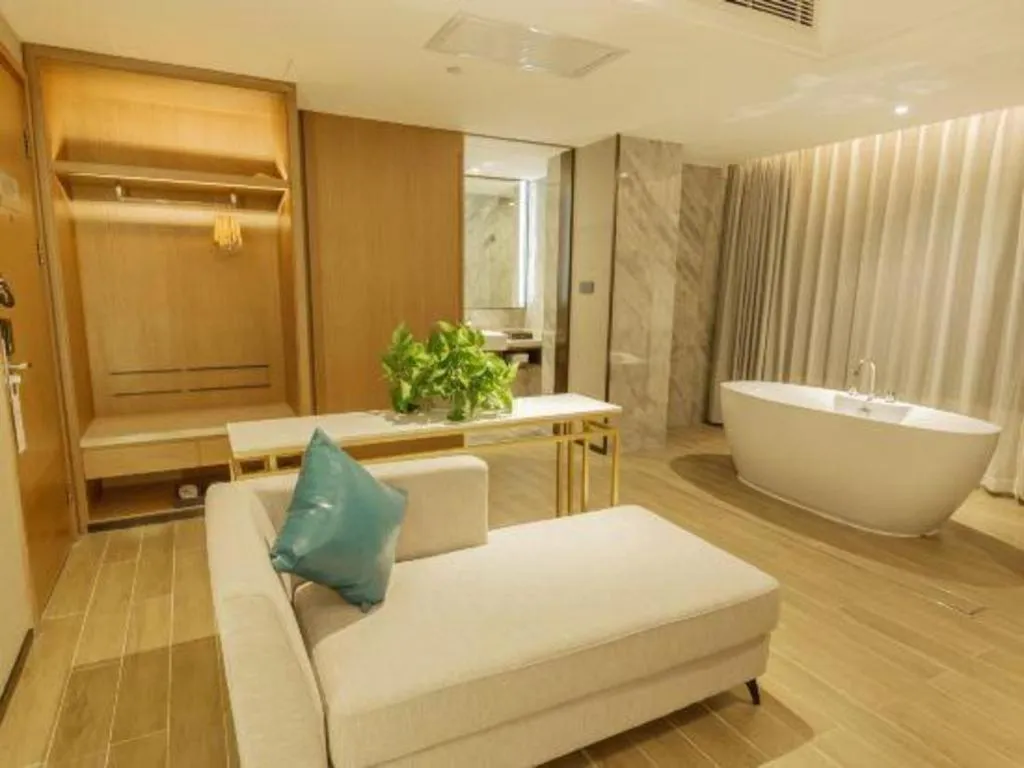 Bed in Borrman Hotel Liuzhou Guizhong Avenue Liugao