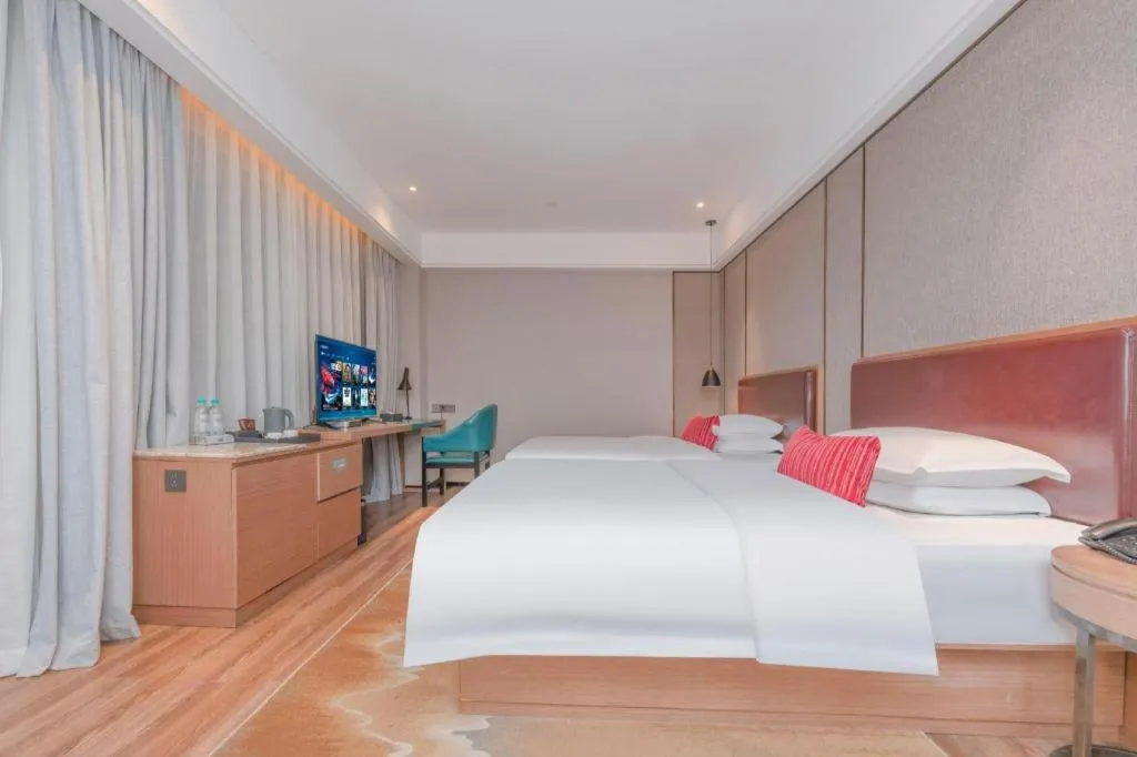 Bed in Borrman Hotel Liuzhou Guizhong Avenue Liugao