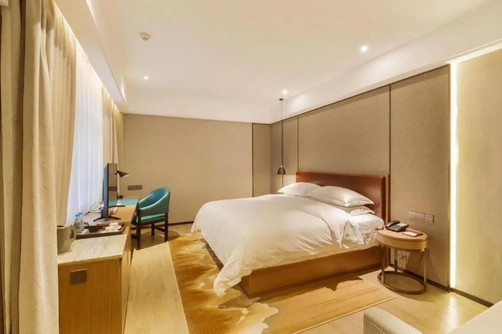 Bed in Borrman Hotel Liuzhou Guizhong Avenue Liugao
