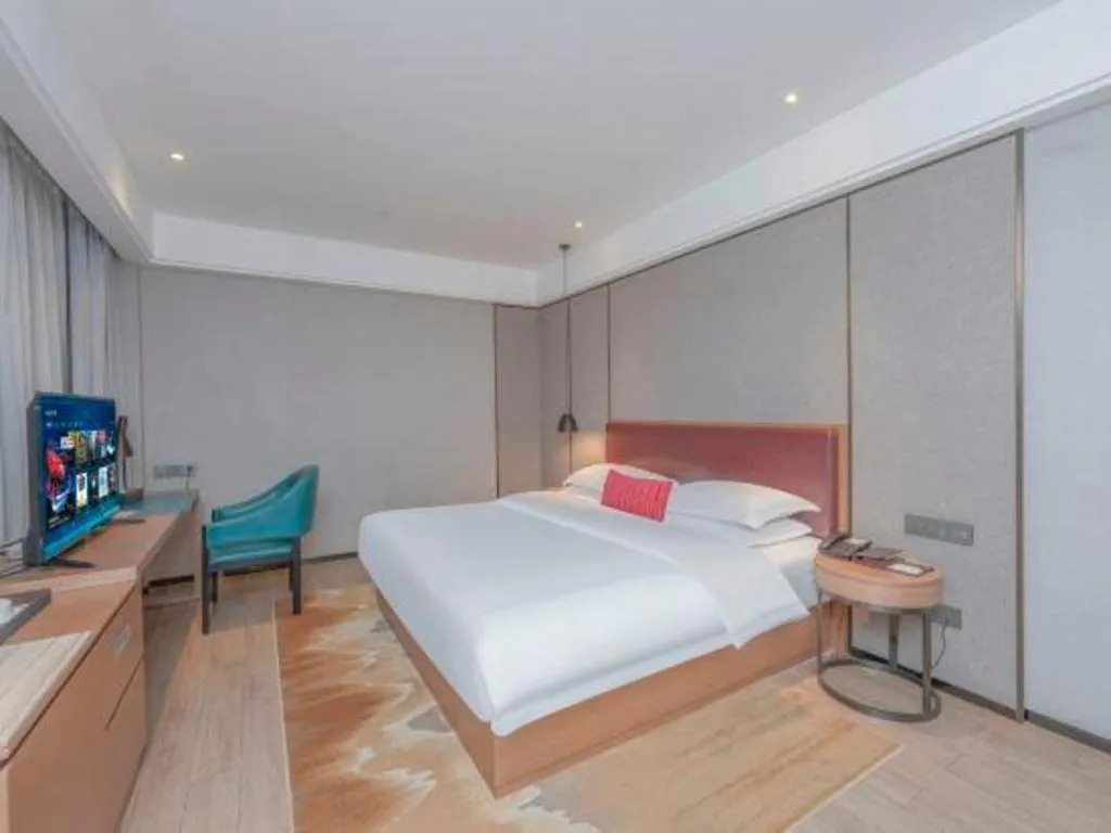 Bed in Borrman Hotel Liuzhou Guizhong Avenue Liugao