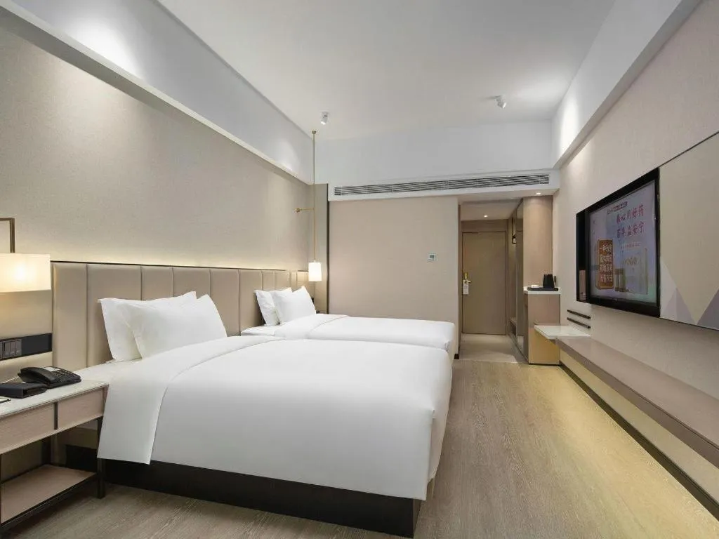 Bed in Borrman Hotel Liuzhou Guizhong Avenue Liugao