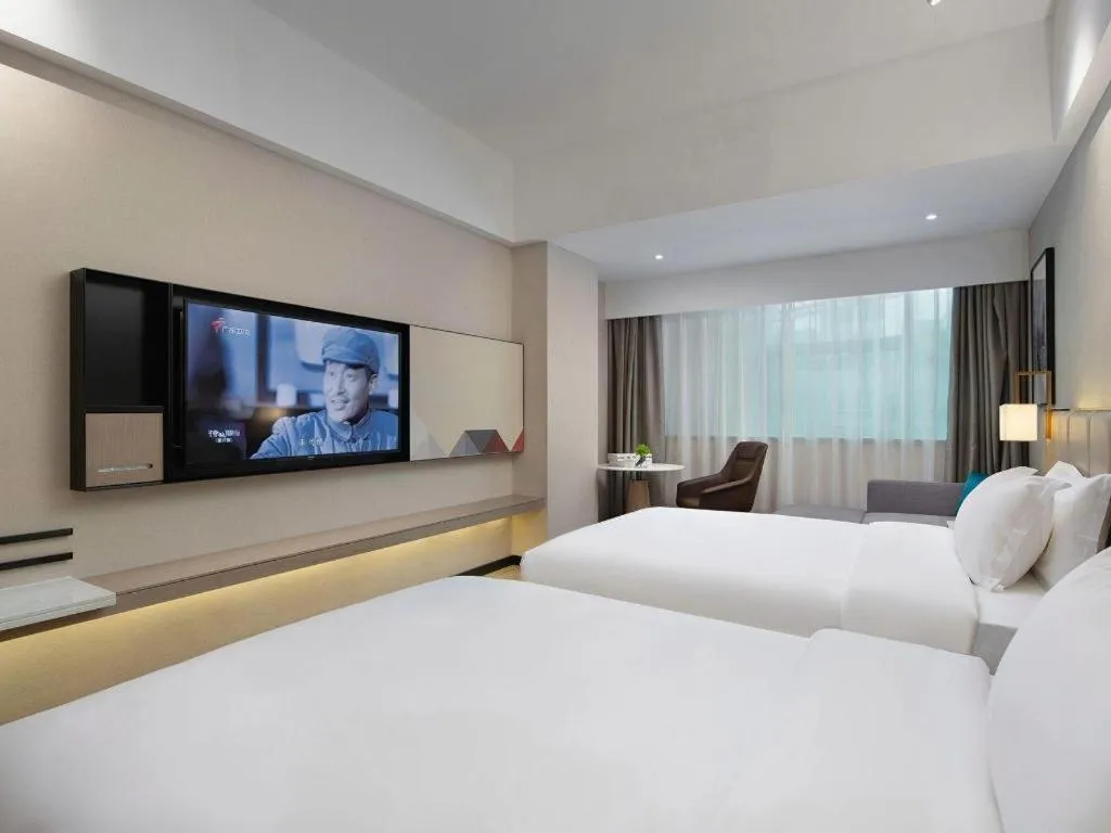 Bed in Borrman Hotel Liuzhou Guizhong Avenue Liugao