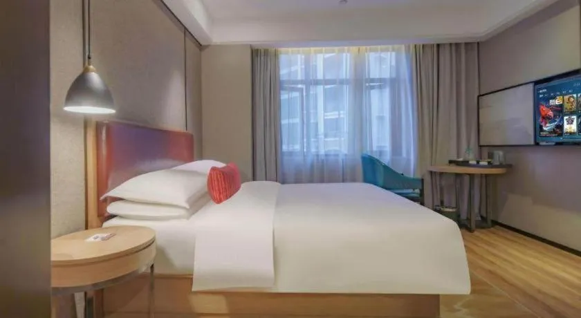 Bed in Borrman Hotel Liuzhou Guizhong Avenue Liugao
