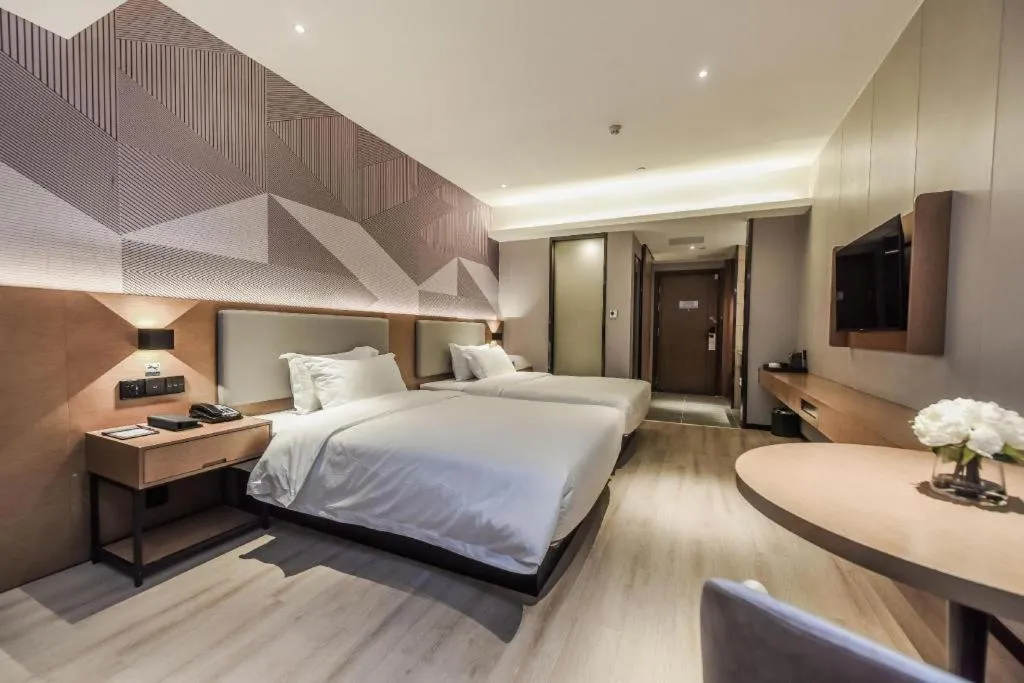 Bed in Borrman Hotel Liuzhou Guizhong Avenue Liugao