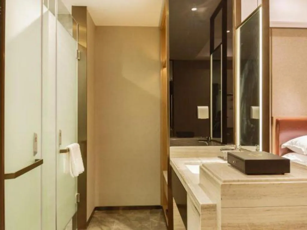 Bed in Borrman Hotel Liuzhou Guizhong Avenue Liugao