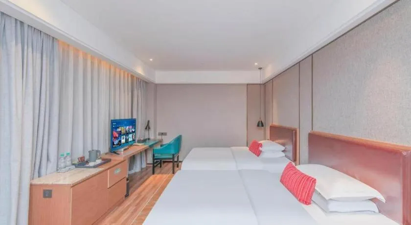 Bed in Borrman Hotel Liuzhou Guizhong Avenue Liugao
