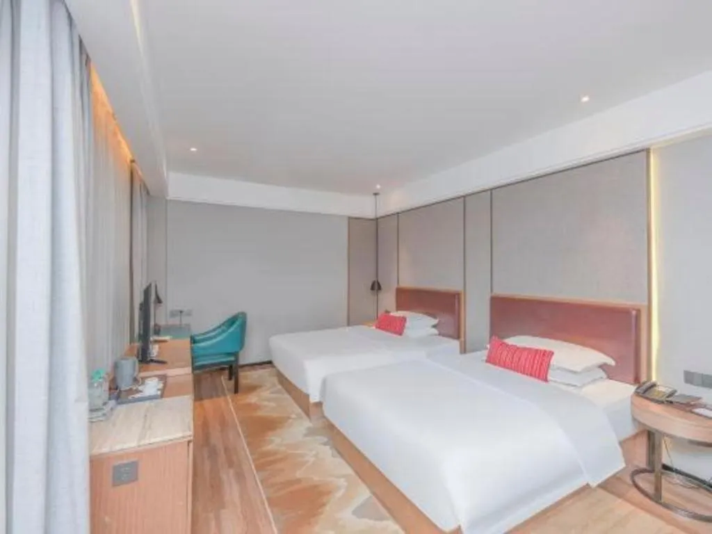 Bed in Borrman Hotel Liuzhou Guizhong Avenue Liugao