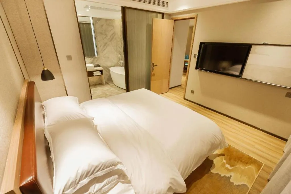 Bed in Borrman Hotel Liuzhou Guizhong Avenue Liugao