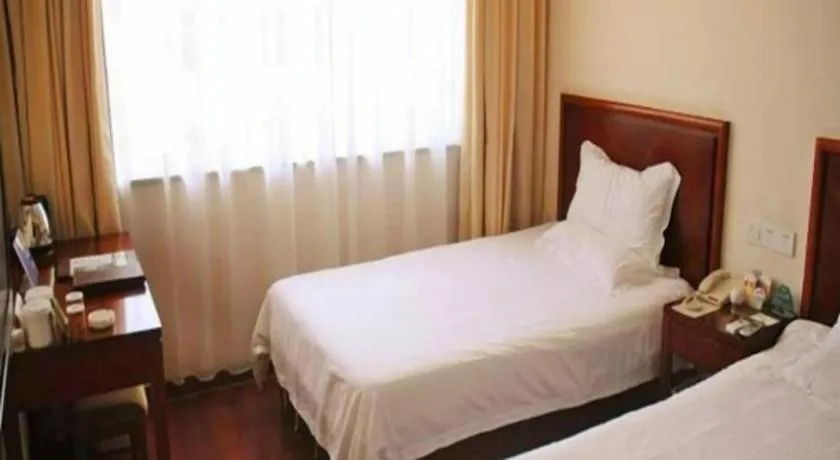 Bed in Borrman Hotel Liuzhou Guizhong Avenue Liugao