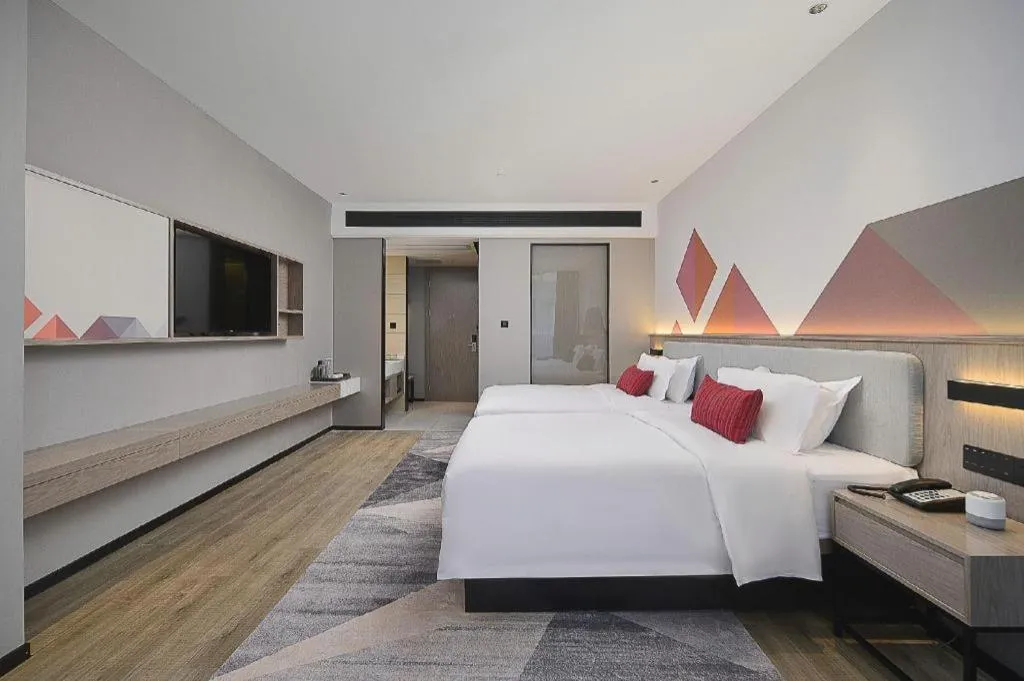 Bed in Borrman Hotel Liuzhou Guizhong Avenue Liugao