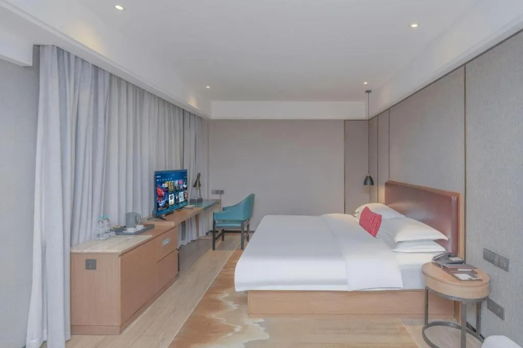 Bed in Borrman Hotel Liuzhou Guizhong Avenue Liugao