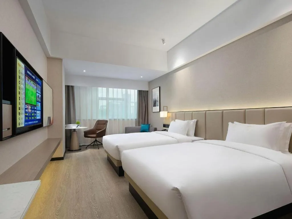 Bed in Borrman Hotel Liuzhou Guizhong Avenue Liugao