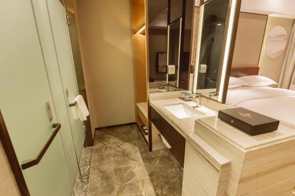 Bed in Borrman Hotel Liuzhou Guizhong Avenue Liugao