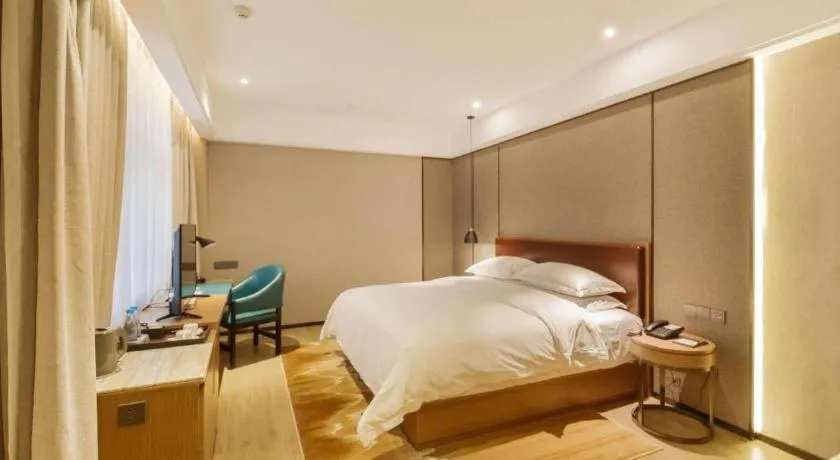 Bed in Borrman Hotel Liuzhou Guizhong Avenue Liugao