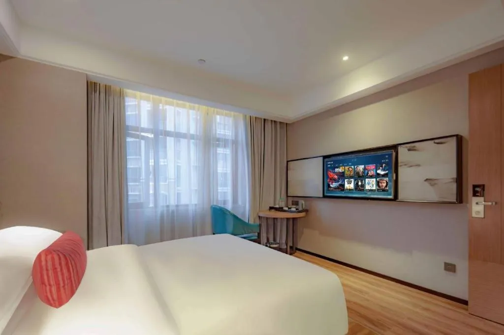 Bed in Borrman Hotel Liuzhou Guizhong Avenue Liugao