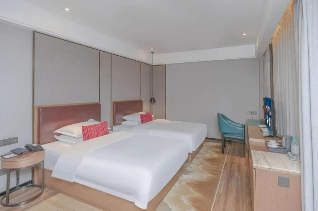 Bed in Borrman Hotel Liuzhou Guizhong Avenue Liugao