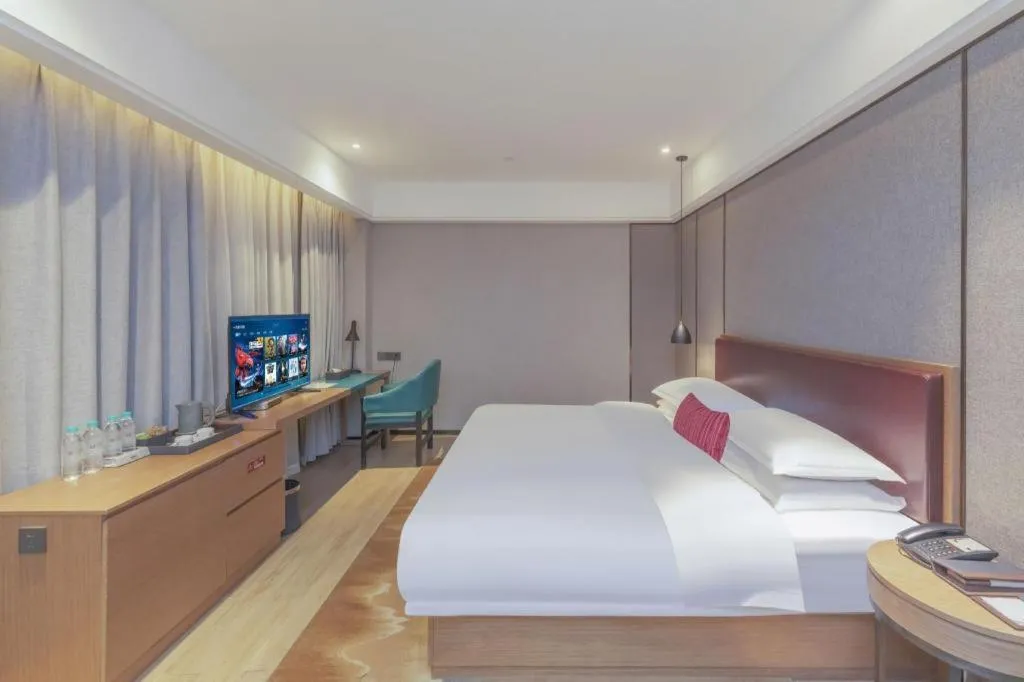 Bed in Borrman Hotel Liuzhou Guizhong Avenue Liugao