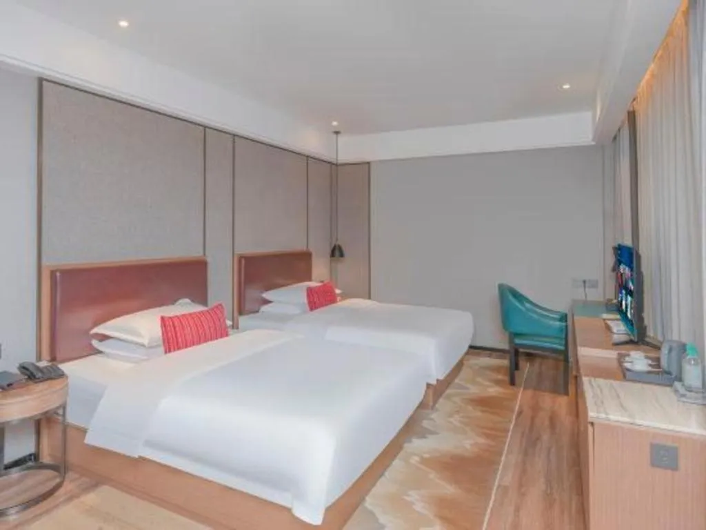 Bed in Borrman Hotel Liuzhou Guizhong Avenue Liugao