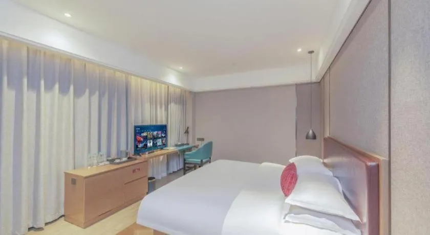 Bed in Borrman Hotel Liuzhou Guizhong Avenue Liugao