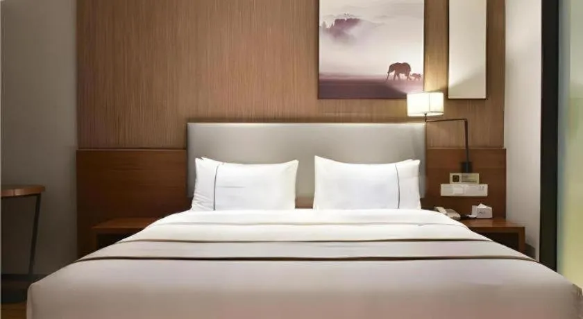 Bed in Jtour Inn Xianning Chongyang Taoxi Avenue