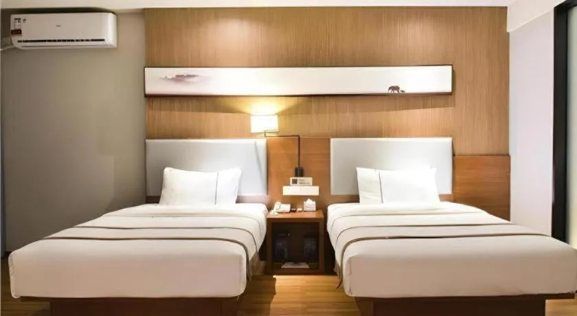 Bed in Jtour Inn Xianning Chongyang Taoxi Avenue