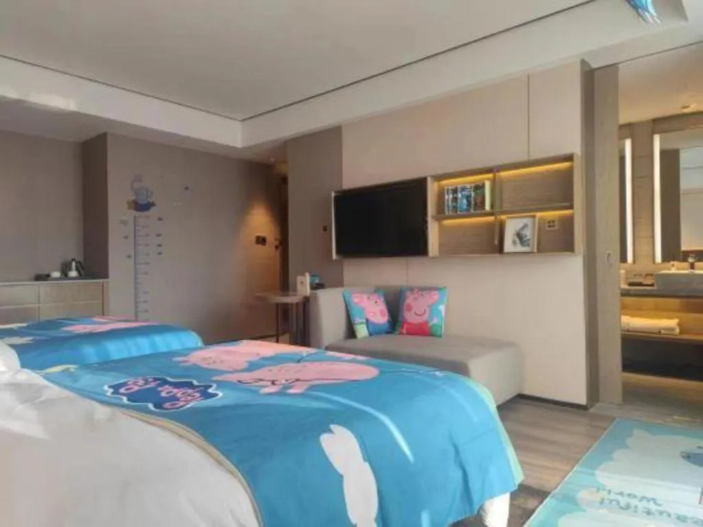 Bed in Echarm Plus Hotel Changsha High-speed Railway South Station Desiqin