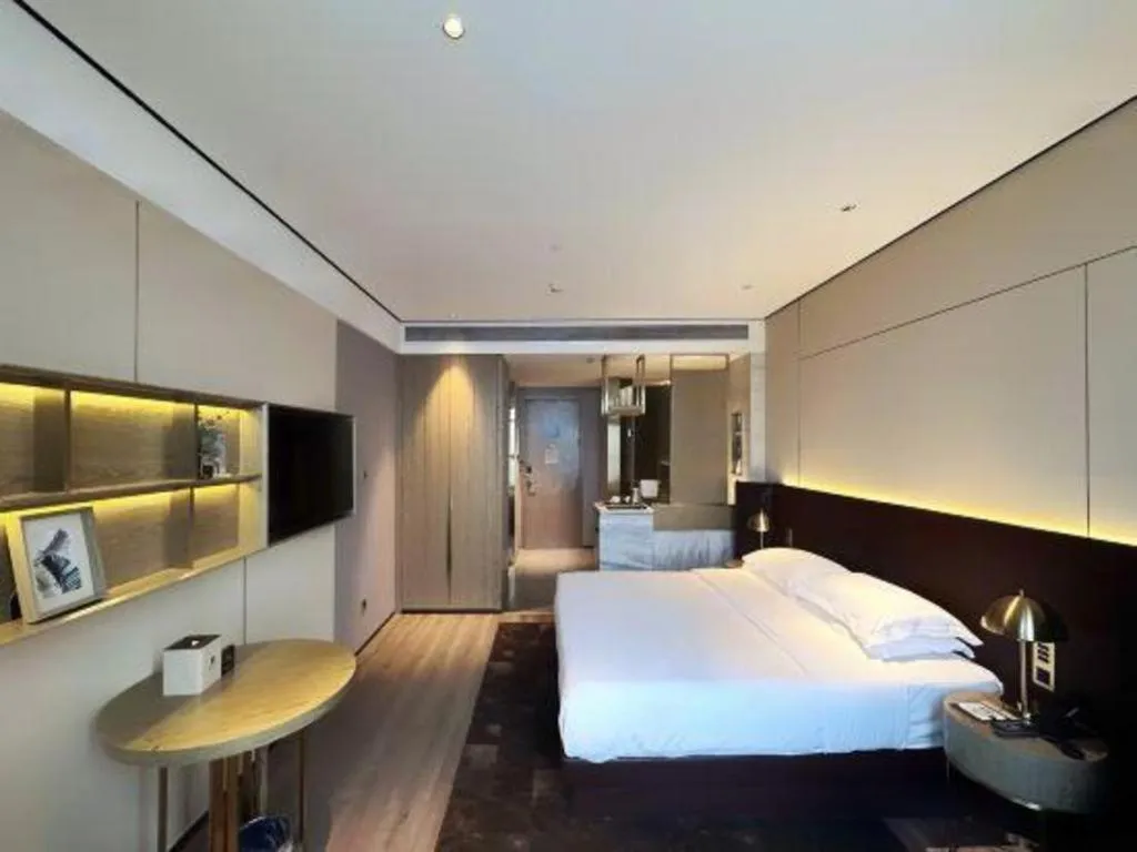 Bed in Echarm Plus Hotel Changsha High-speed Railway South Station Desiqin