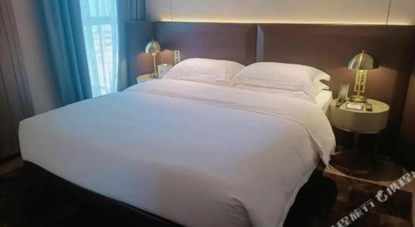 Bed in Echarm Plus Hotel Changsha High-speed Railway South Station Desiqin