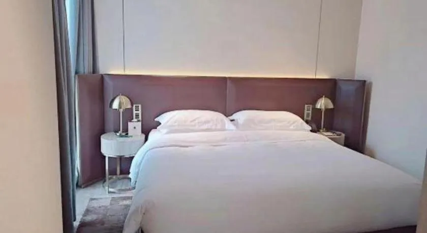 Bed in Echarm Plus Hotel Changsha High-speed Railway South Station Desiqin