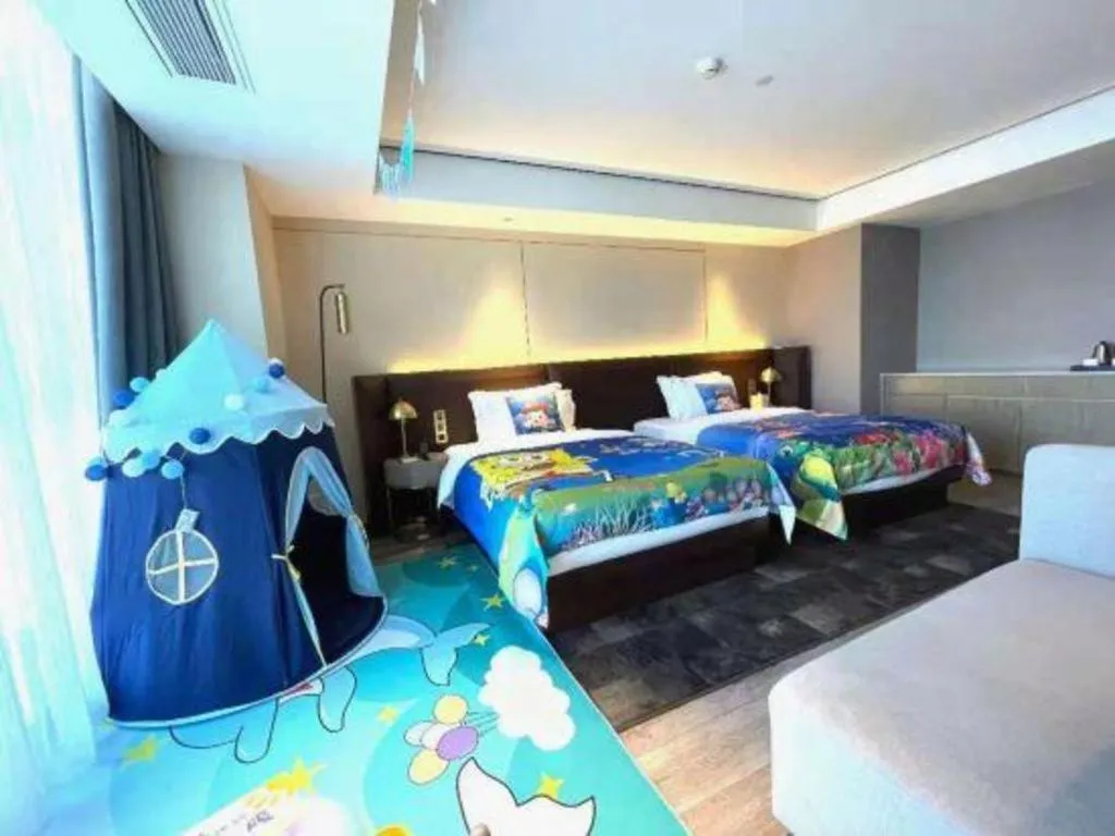 Bed in Echarm Plus Hotel Changsha High-speed Railway South Station Desiqin